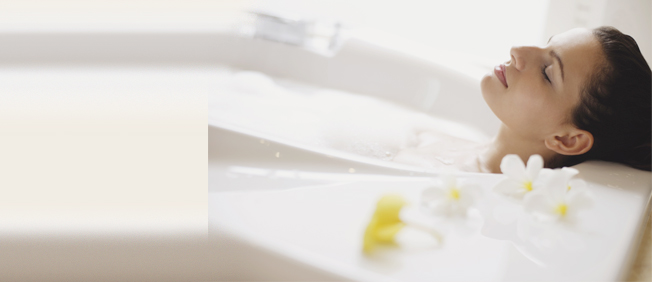 Closeup of woman enjoying a warm bath